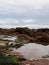 Pennan beach and village at low tide in September 2022. Aberdeenshire, Scotland, UK