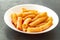 Penne Amatriciana fresh pasta with parmesan cheese on dark background