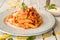 Penne in creamy tomato sauce with sour cream and Voka