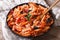 Penne with eggplant and tomatoes close-up. horizontal
