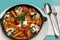 Penne Italian style food with tomatoes and cheese