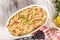 Penne pasta casserole with cheese