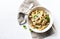 Penne pasta with mushrooms, chicken, spinach and cream sauce. Mediterranean cuisine.