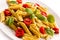 Penne, pesto sauce and vegetables