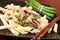 Penne with pork, green beans and onion
