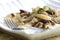 penne with pork pieces and champignons