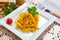 Penne with speck and saffron