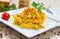 Penne with speck and saffron