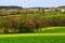 Pennsylvania countryside and farms in spring near Kutztown. Fields just starting to be plowed.