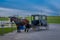 Pennsylvania, USA, APRIL, 18, 2018: Outdoor view of parked Amish buggy carriage in a farm with a horse used for a pull