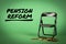 PENSION REFORM concept. Miniature chair and change on a green background