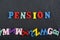 PENSION word on black board background composed from colorful abc alphabet block wooden letters. Learning