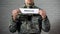 Pension word written on sign in hands of male soldier, retirement payments