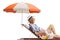 Pensioner enjoying on a sunbed under umbrella with an inflatable beach ball