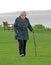Pensioner exercising walking