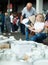 Pensioner family buys vintage dishes at a flea market