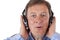 Pensioner with headphones singing to mp3 music