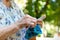 Pensioner woman knitting socks for her grandchildren, retiree lifestyle concept, enjoys in retirement