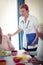 Pensioners at lunch with nurse