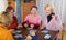 Pensioners playing board game