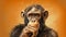 Pensive Chimpanzee Drawing On Orange Background