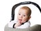 Pensive kid in a children\'s chair for the machine
