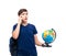 Pensive male student holding globe