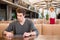 Pensive man sitting at the table in restaurant