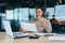 Pensive serious businessman reading financial report, hispanic businessman holding document in hands looking