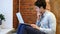 Pensive Thinking Man Working on Laptop, Sitting on Stairs