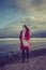 Pensive woman on Portobello Beach, Edinburgh, Scotland