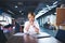 Pensive woman sitting at table in office