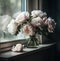 Peonies in gray sky, dark shadows, by window.