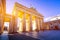 people admire Brandenburg Gate Brandenburger Tor in Berlin in late afternoon