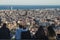 People admiring the views of the city of Barcelona.