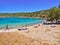 People in Agia Dynami  beach, bright summer day