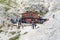 People at alpine Hut Bullelejochhutte in Sexten Dolomites, South Tyrol