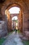 People in arches gallery hall in Domus Severiana which is the modern name given to the final extension to the imperial palaces on