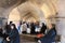 People in the arches under the Khaju Bridge in Isfahan, Iran