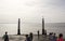 People around Columns Wharf in Lisbon