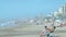 People on the Atlantic coast beach, Argentina