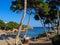 People attend beach at Cala Esmeralda bay in Majorca