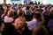 People attend a conference in a big hall