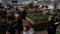 People attend spring flowers market at day time