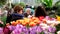 People attend spring flowers market at day time