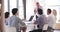 People Attending Business Meeting In Modern Open Plan Office