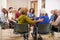 People Attending Self Help Therapy Group Meeting In Community Center