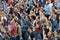 People from the audience watching a concert