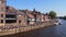 People on the banks of the river Ouse in the centre of York, Northern England