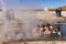 People bathing in a hot spring pool at he Geysers del Tatio field in the Atacama Desert, Northern Chile